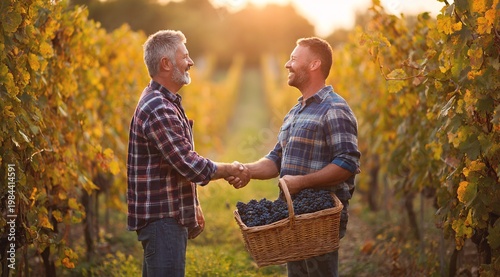 Two winemakers shaking hands in vineyard with basket of harvested grapes