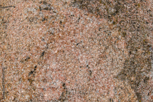 Fotografie Granite rock surface displaying weathered texture outdoors