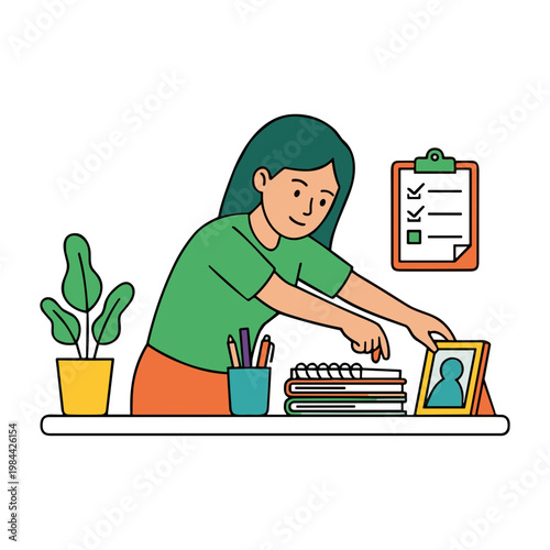 Woman places photo on desk near plant and books in office setting