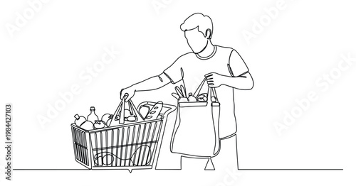 Man shopping for groceries placing food items from a cart into a reusable ecofriendly bag representing sustainable consumption and household chores perfect for retail or lifestyle concepts