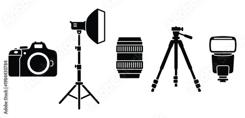Essential photography equipment set including camera, softbox, lens, tripod, and flash, perfect for visual content related to professional photo studios and creative projects.