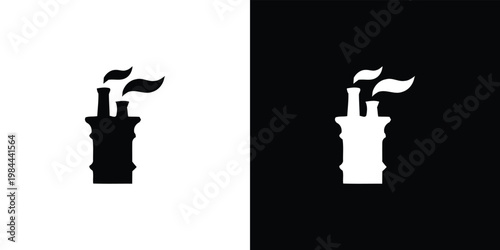 Black and white factory chimney on split background smoke silhouette
