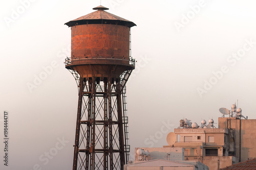 Limassol Water Tower standing over city buildings. Limassol, Cyprus