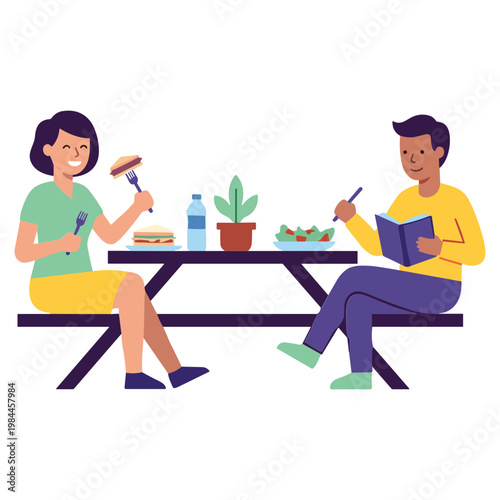 People sitting at picnic table eating and writing in notebook outdoors