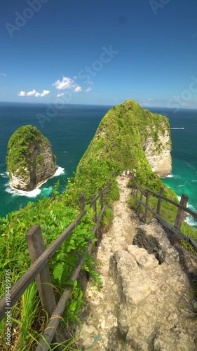 Cinematic view of Kelingking Beach on Nusa Penida, Bali, with dramatic cliffs, turquoise ocean and epic tropical landscape.