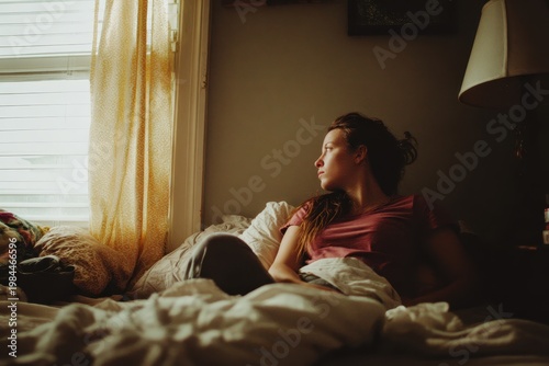 Wallpaper Mural Young adult at home in natural light authentic lifestyle portrait Torontodigital.ca