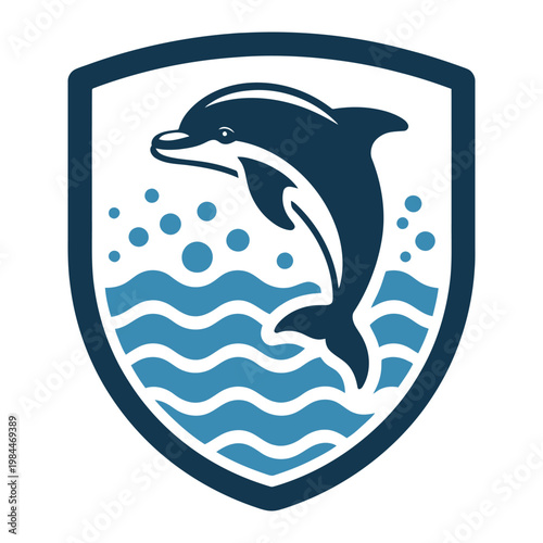 Dolphin leaping over stylized waves in a shield emblem
