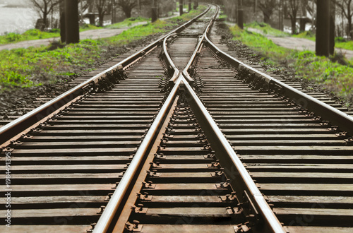 crossing Railway track  perspective View of the cross crossing railway train tracks are on a railroad track