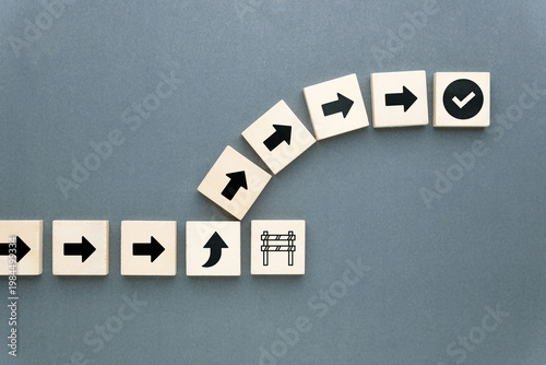 Tableau sur toile Arrows shift direction to bypass a barrier and reach success, representing strat