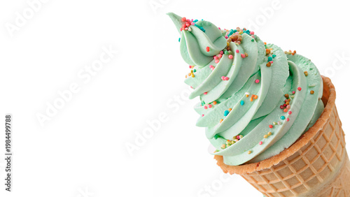 Принти на полотні Mint ice cream cone with colorful sprinkles enjoyed at a sunny summer event in a