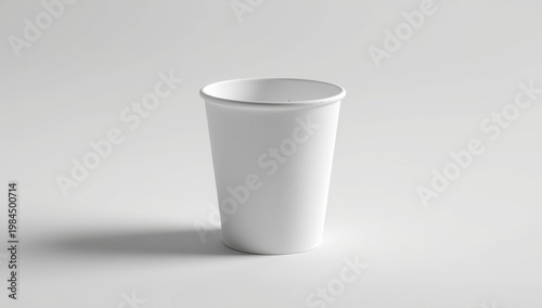 Single paper cup on a white backdrop.
