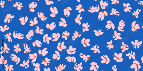 A floral seamless vector pattern in soft pink and coral on deep blue background with hand-painted organic blooms
