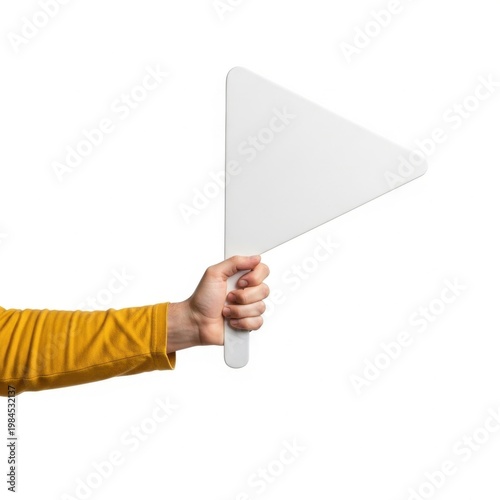 Person holding a smartphone with a yellow background