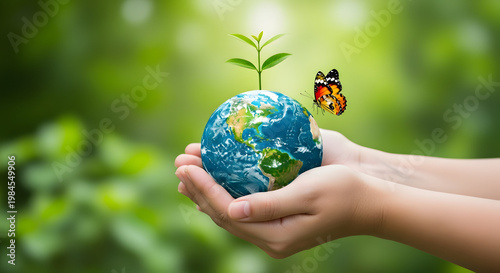 A person holding a globe with a plant and butterfly on transparent background