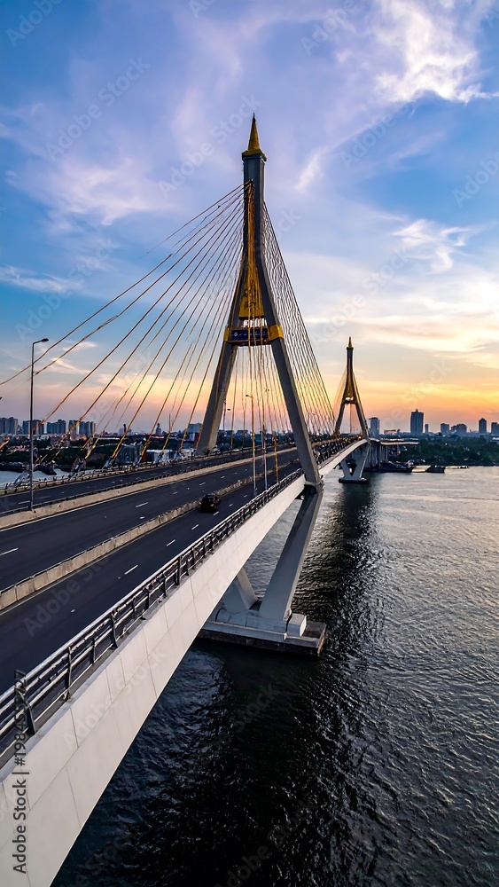 Obraz premium Bridge Over River Sunset.