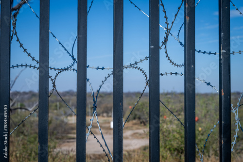Photos border fence with barbed wire