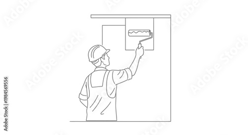 Worker in hard hat and overalls painting an interior wall with a roller, illustrating the process of home renovation and construction work, a symbol of improvement and skilled labor