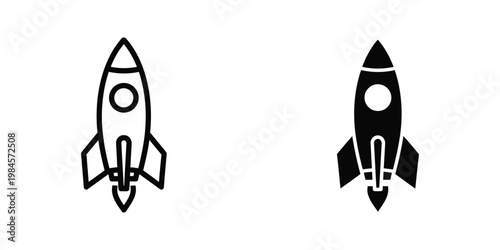 Contrasting black and white silhouettes of space rockets in flight orientation