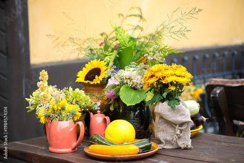 Colorful Autumn Still Life With Flowers And Vegetables