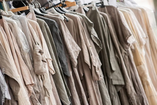 Neutral Linen Clothing Collection Hanging On Rack