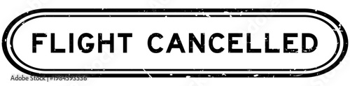 Grunge black flight cancelled word rubber seal stamp on white background