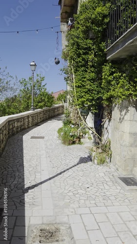 Wallpaper Mural A narrow street among the houses of  Guardia Sanframondi, a medieval town in Campania, Italy. Torontodigital.ca