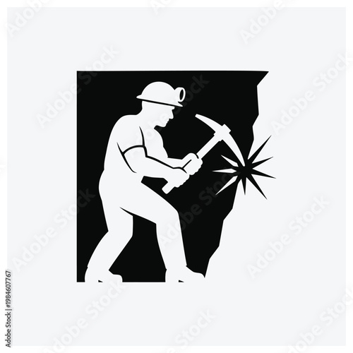 Silhouette of a miner working with a pickaxe.