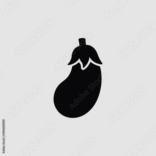 Simple black silhouette of an eggplant on a light grey background