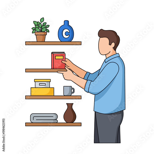 Man organizing shelves with books and decor
