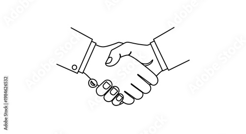 Two businesspeople engage in a formal handshake agreement indoors with colleagues.