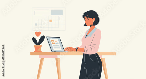 woman working on laptop at desk.