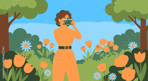 Woman taking photos in a garden.