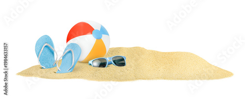 A ball, flip-flops and glasses lie on a pile of sand on a white isolated background