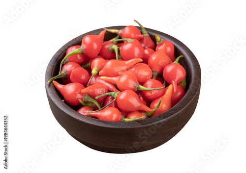 Assorted whole wheat pasta on spoons isolated over white background
