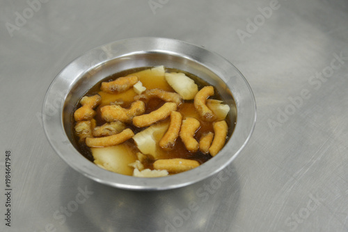 Douhua (Tofu Pudding or Soy Milk Pudding or Soy Bean Curd) in Ginger Soup is a popular Chinese sweet. It is normally eat with small Deep Fried Dough or Patongo in Thai.