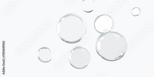 Abstract composition of transparent bubbles floating on a white background