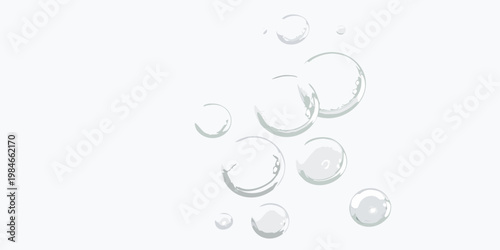 Floating soap bubbles against a plain light gray background