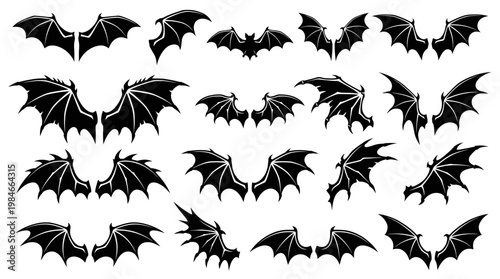 Large collection of black bat and dragon wing silhouettes isolated on white background, concept for halloween graphic design, tattoo art inspiration and mystical character illustration