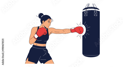 Strong female athlete wearing red boxing gloves practices her punches on a heavy black bag in a fitness studio or training gym.