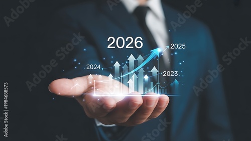 Futuristic digital visualization depicting business growth and financial success, with an ascending arrow chart projecting goals and future achievements up to 2026