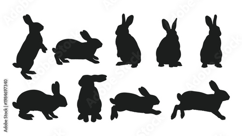 A collection of black silhouette rabbits in various poses and positions