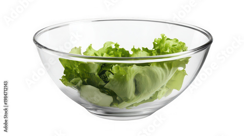 A clear glass bowl filled with fresh lettuce on transparent background
