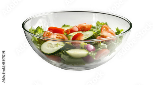 A clear glass bowl filled with a fresh salad on transparent background