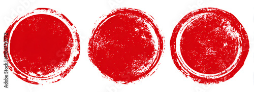 Set of three red grunge circle stamps with distressed textures, ideal for design elements and overlays.