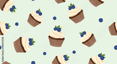 Delicious cupcake seamless pattern featuring chocolate cakes with white frosting and fresh blueberries on light green.
