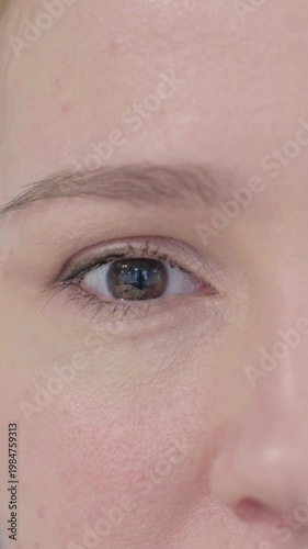 Wallpaper Mural Close Up of Blinking Female Eyes, Vertical Video Torontodigital.ca