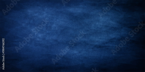 A dark blue grunge background with a vintage textured pattern on an old dirty wall canvas creates a blank retro design for a purple and blue paint art illustration backdrop