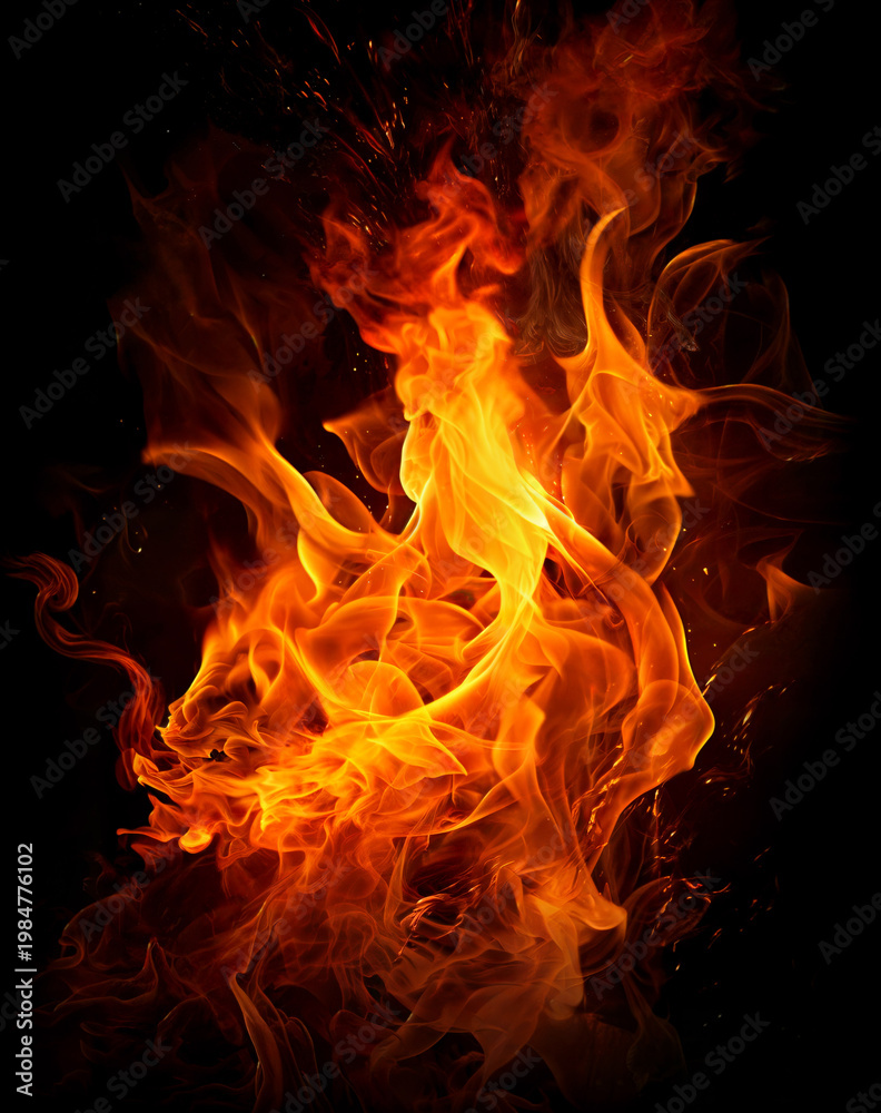 Fototapeta premium Blazing Inferno: A dramatic capture of swirling flames, a dance of vibrant orange and yellow hues against a dark background, embodies raw power and elemental energy.