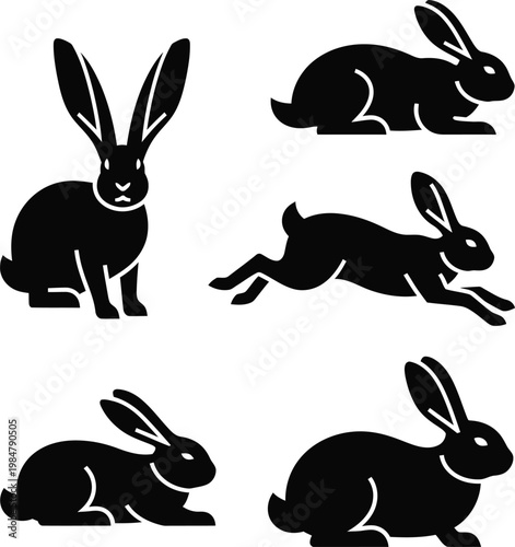 Five black rabbit silhouettes in various poses