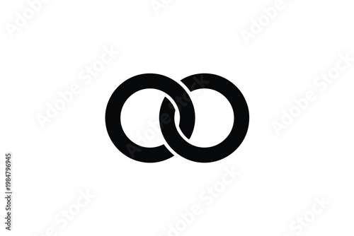 Interlocking black rings create an infinity symbol on a stark white background